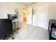 Comfortable office space with modern desk, chair, and two closets at 17344 York Ave, Port Charlotte, FL 33948