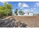 Backyard view with foliage and blue sky at 175 Rodgers Ne Ave, Port Charlotte, FL 33952