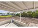 A view of the backyard and covered patio at 175 Rodgers Ne Ave, Port Charlotte, FL 33952