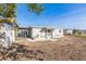 Backyard view with shed and covered patio at 175 Rodgers Ne Ave, Port Charlotte, FL 33952