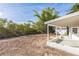 A spacious backyard with open space and lush plants at 175 Rodgers Ne Ave, Port Charlotte, FL 33952