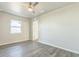 Bedroom with a ceiling fan and a window at 175 Rodgers Ne Ave, Port Charlotte, FL 33952