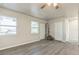 A view of an empty living room featuring hard wood floors and natural light at 175 Rodgers Ne Ave, Port Charlotte, FL 33952