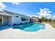 Refreshing pool and patio area with well-maintained landscaping at 18610 Fort Smith Cir, Port Charlotte, FL 33948