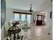 Spacious living room with a contemporary white leather sofa and elegant interior design at 21287 Birwood Ave, Port Charlotte, FL 33954
