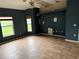 Empty bedroom with ceiling fan, large windows, and tile floors at 2143 Santonian Ter, North Port, FL 34286