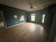 Empty bedroom features tile floors, ceiling fan, and large windows at 2143 Santonian Ter, North Port, FL 34286