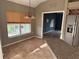 Eat-in kitchen area with tile floors, breakfast bar, stainless steel fridge, and window with view at 2143 Santonian Ter, North Port, FL 34286