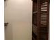 Walk in closet with wood slatted shelving and storage at 21460 Sheldon Ave, Port Charlotte, FL 33952