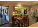 Charming dining area open to the kitchen with access to outdoor patio area at 21460 Sheldon Ave, Port Charlotte, FL 33952