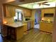 Well-lit kitchen featuring wooden cabinetry, stainless steel appliances, and ample counter space at 21460 Sheldon Ave, Port Charlotte, FL 33952