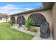 Relaxing screened-in patio with tiled floors, ideal for outdoor dining and entertainment overlooking the backyard at 21460 Sheldon Ave, Port Charlotte, FL 33952