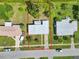 Aerial image highlighting the property lines and the home's placement on the lot at 22219 Catherine Ave, Port Charlotte, FL 33952