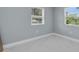 Cozy bedroom with neutral walls, and white marble-patterned tile flooring at 22219 Catherine Ave, Port Charlotte, FL 33952