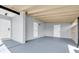 Covered patio area with multiple access doors, offering convenient outdoor access and storage at 22219 Catherine Ave, Port Charlotte, FL 33952