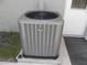 A well-maintained and up-to-date air conditioner unit, situated beside the house at 23167 Turnbull Ave, Port Charlotte, FL 33954
