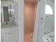 Bathroom featuring a step-in shower and white cabinets at 23167 Turnbull Ave, Port Charlotte, FL 33954
