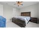 Cozy bedroom featuring a wooden bed frame and neutral color palette at 2477 Gabel Oak Dr, North Port, FL 34289