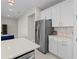 Open kitchen layout with stainless steel appliances and ample counter space at 2477 Gabel Oak Dr, North Port, FL 34289