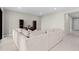 Spacious living room featuring a large sectional sofa, recessed lighting, and tile flooring at 2477 Gabel Oak Dr, North Port, FL 34289