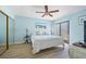 Cozy bedroom with neutral walls, recessed lights, and a sliding glass door to a private patio at 25188 Marion Ave # 45, Punta Gorda, FL 33950