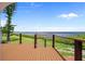 Relaxing waterfront deck featuring a cable railing and peaceful views of the open water at 25188 Marion Ave # 45, Punta Gorda, FL 33950
