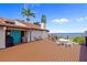 Waterfront home with a spacious deck and outdoor seating, perfect for enjoying scenic water views at 25188 Marion Ave # 45, Punta Gorda, FL 33950