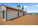 Exterior view with a spacious deck perfect for enjoying the waterfront, complimented by a stylish Spanish tile roof at 25188 Marion Ave # 45, Punta Gorda, FL 33950
