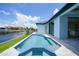 Charming backyard pool and canal view, perfect for entertaining or relaxing in your own private waterfront retreat at 2815 Coral Way, Punta Gorda, FL 33950