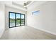 Bedroom with large sliding doors reveals a beautiful canal view at 2815 Coral Way, Punta Gorda, FL 33950
