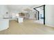 Spacious kitchen with a large island and access to the lanai and backyard at 2815 Coral Way, Punta Gorda, FL 33950