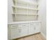 Pantry with storage shelves, quartz countertop, and convenient cabinets at 2815 Coral Way, Punta Gorda, FL 33950