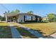 Attractive single-story home with a convenient covered carport and a delightful screened-in porch at 3197 Normandy Dr, Port Charlotte, FL 33952