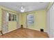 Empty bedroom filled with natural light, featuring hardwood floors and ample space at 3305 Nansen Ln, North Port, FL 34286