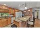 Bright kitchen with ample counter space, stylish barstools, and modern appliances at 3305 Nansen Ln, North Port, FL 34286