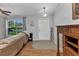Cozy living room featuring comfortable seating, a large window, and stylish decor at 3305 Nansen Ln, North Port, FL 34286