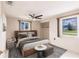 Bright bedroom features a comfortable bed, two windows, and classic finishes that create a relaxing retreat at 3497 Cohoes St, Port Charlotte, FL 33952