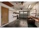 A garage with overhead lighting and workbench at 3497 Cohoes St, Port Charlotte, FL 33952