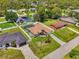 Aerial view of a single-Gathering home with an enclosed pool, and large backyard at 4038 Corydon Ave, North Port, FL 34286