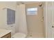 Bathroom shower features tiled walls and ceiling, and handheld shower head at 4038 Corydon Ave, North Port, FL 34286