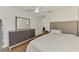 Bedroom featuring wood floors, closet, and modern furnishings at 4038 Corydon Ave, North Port, FL 34286