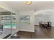 Dining area with sliding door access to the pool and lanai, creating a perfect indoor-outdoor living space at 4038 Corydon Ave, North Port, FL 34286