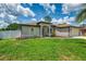 Lovely single-story home with a manicured lawn and a welcoming entrance, complemented by the attached two-car garage at 4038 Corydon Ave, North Port, FL 34286