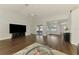 Open-concept living room features modern furnishings, ample space, and easy access to the pool area at 4038 Corydon Ave, North Port, FL 34286