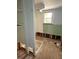 Bathroom mid-renovation, with exposed plumbing and a vintage-style sink at 420 W Olympia Ave, Punta Gorda, FL 33950