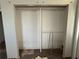 View of a closet needing renovation with white walls and shelves at 420 W Olympia Ave, Punta Gorda, FL 33950