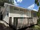 Exterior view showcasing a charming deck, ideal for outdoor relaxation at 420 W Olympia Ave, Punta Gorda, FL 33950