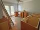 View of a living room needing renovation and without flooring at 420 W Olympia Ave, Punta Gorda, FL 33950