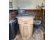 Picture of a utility room in need of renovation with a garbage can visible at 420 W Olympia Ave, Punta Gorda, FL 33950