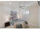Cozy bedroom offers neutral paint, a comfortable bed, and serene decor, creating a peaceful and inviting retreat at 4334 Corso Venetia Blvd, Venice, FL 34293